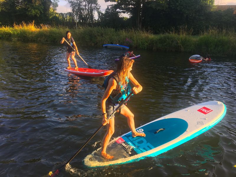 SUP, kayak or canoe stand Up paddle board sunset paddle